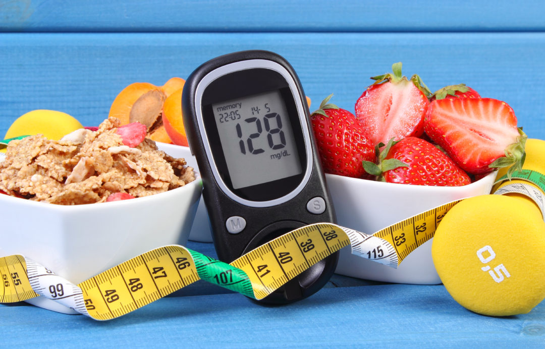 glucose-meter-with-sugar-level-healthy-food-dumbbells-and-centimeter